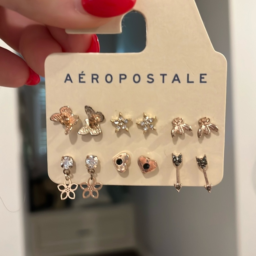 A six pack of aeropostale earrings